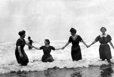 Women in bathing costumes in Pacific Ocean at Moclips